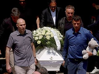 Burials held in Serbia for some victims of mass shootings