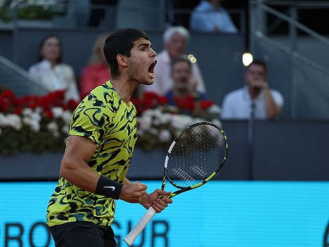 Spain's Carlos Alcaraz celebrates during the 2023 ATP Tour Madrid Open tennis tournament singles final match against Germany's Jan-Lennard Struff at Caja Magica in Madrid on May 7, 2023.