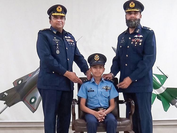 Pakistan Air Force’s Air Vice Marshal Khalid Mehmood and Air Commodore Asim Rana awarded ranks to young Abdullah Naveed. 