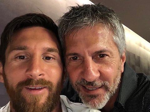 Jorge Messi with his son, Lionel Messi.