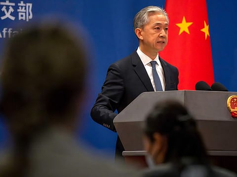 Chinese Foreign Ministry spokesperson Wang Wenbin speaks during a press conference in Beijing, on May 9, 2023.  
