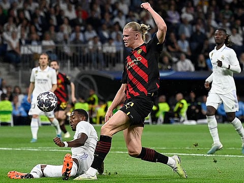 Manchester City's Erling Haaland (right) vies with Real Madrid defender David Alaba during the Uefa Champions League semi-final on Tuesday.