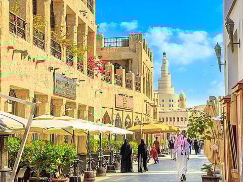 Inside Souq Waqif old market with cafes and restaurants.