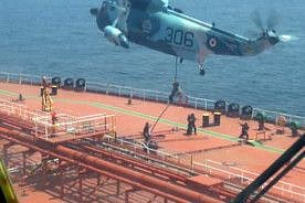 This grab taken from a video released by Iran's Army office on April 28, 2023, shows Iranian naval soldiers boarding the Advantage Sweet oil tanker off the coast of Oman.  