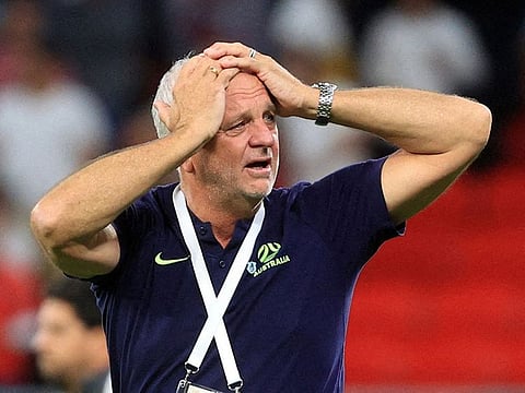 File: Australia coach Graham Arnold celebrates after qualifying for the FIFA World Cup, June 13, 2022