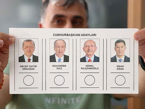 A person holds the ballot during the Turkish presidential and parliamentary elections at a polling station in Ankara, Turkey May 14, 2023.