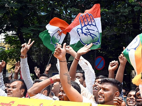 Congress supporters celebrate the party's victory in the Karnataka Assembly elections, in Bengaluru 
