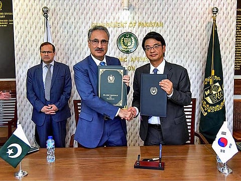 Pakistan Government official signs agreement with the Ambassador of South Korea to Pakistan Suh Sangpyo under the G-20 Debt Service Suspension initiative on May 15, 2023.  