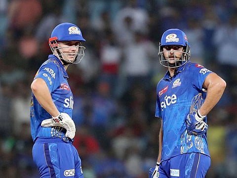 Cameron Green and Tim David of the Mumbai Indians during the Tata Indian Premier League match against the Lucknow Super Giants at the Bharat Ratna Shri Atal Bihari Vajpayee Ekana Cricket Stadium, Lucknow, on May 16, 2023. The duo were unable to take Mumbai to the victory that would have brought them closer to a playoff spot. 