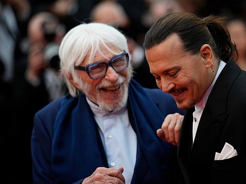 Pierre Richard, and Johnny Depp pose for photographers upon arrival at the opening ceremony and the premiere of the film 'Jeanne du Barry' at the 76th international film festival, Cannes, southern France, on May 16, 2023.