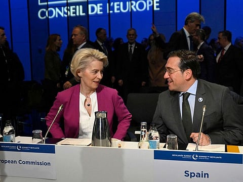 President of the European Commission Ursula von der Leyen (left) and Spain's Foreign Minister Jose Manuel Albares Bueno take seat to attend the closing session on the second day of the 4th Summit of the Heads of State and Government of the Council of Europe, at the Harpa concert hall in Reykjavik, Iceland, on May 17, 2023.  
