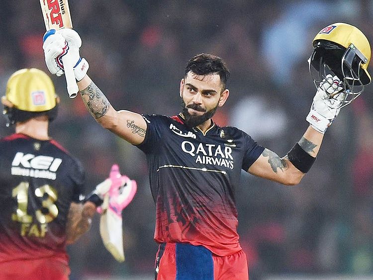 Royal Challengers Bangalore's Virat Kohli celebrates after scoring a century