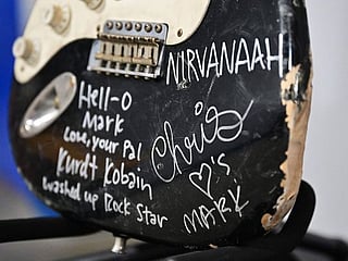 Guitar smashed by Nirvana's Kurt Cobain sells for nearly $600,000