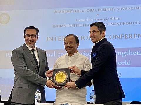 (from left) Prof. Dheeraj Sharma, Minister V Muraleedharan and Consul General Dr Aman Puri during the valedictory day of the 19th World Congress of the Academy for Global Business Advancement in Dubai on Sunday