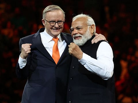 India's Prime Minister Narendra Modi and Australia's Prime Minister Anthony Albanese during an event with members of the local Indian community at the Qudos Arena in Sydney on May 23, 2023.  