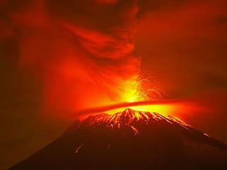Pictures: Mexican volcano Popocatepetl spews ash and smoke as authorities urge caution 