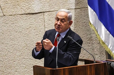 Israel's Prime Minister Benjamin Netanyahu speaks during the budget session at the parliament in Jerusalem on May 23, 2023.