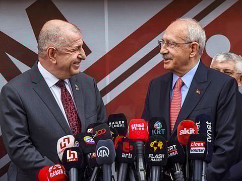 In this handout photo released by Turkish Republican People's Party, CHP, Turkish CHP party leader and Nation Alliance's presidential candidate Kemal Kilicdaroglu, right, and Umit Ozdag, the leader of the far-right Victory Party, talk to journalists during a joint news conference in Ankara, Turkey, Wednesday, May 24, 2023.