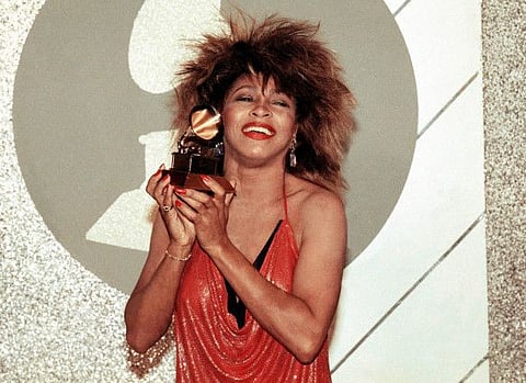 FILE - Tina Turner, Pop and R&B vocalist, as holds up a Grammy Award, February 27, 1985, in Los Angeles.