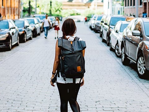 Stow them under the airplane seat or in the overhead cabin; travel backpacks come with you where a suitcase cannot.