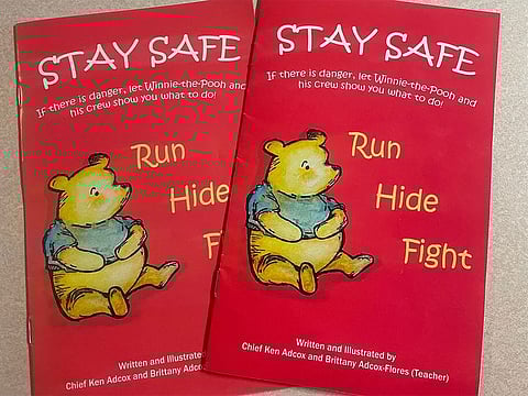 The “Stay Safe” book distributed to students in the Dallas Independent School District features Winnie-the-Pooh characters instructing students to run, hide and fight in a school shooting.