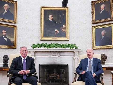 US President Joe Biden (right) meets with US House Speaker Kevin McCarthy about the debt ceiling, in the Oval Office of the White House in Washington, DC, on May 22, 2023. US President Joe Biden and Republican legislators have reached an agreement in principle to raise the US debt ceiling and thereby avoid catastrophic default, US media reported.
