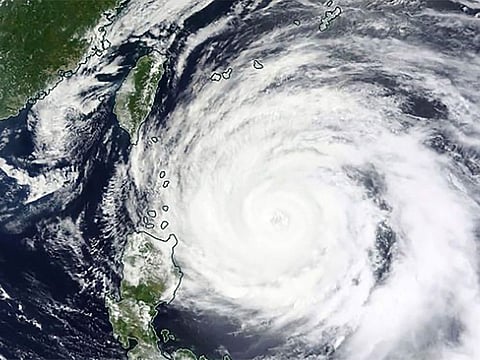 This Monday, May 29, 2023 satellite image released by NASA shows Typhoon Mawar approaching Philippines' northern provinces.
