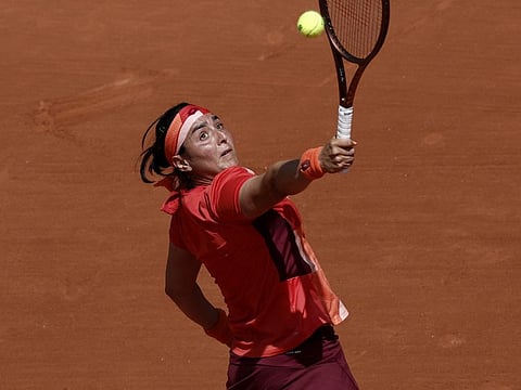Tunisia's Ons Jabeur in action during her first round match against Italy's Lucia Bronzetti.