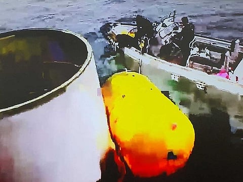 A handout picture shows what is believed to be a part of a space launch vehicle that North Korea said crashed into the sea off the west coast of the divided peninsula, South Korea, May 31, 2023.   