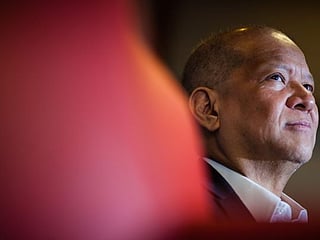 Philippine billionaire Ang boosts stake in San Miguel parent