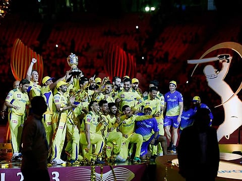 File photo: Chennai Super Kings' players pose with the IPL trophy in celebration as CSK beat Gujarat Titans by 5 wickets during the final of Indian Premier League 2023, at Narendra Modi Stadium, in Ahmedabad. 