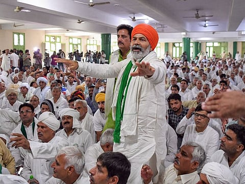 Farmer leader Rakesh Tikait speaks during a Khap panchayat members meeting organized to discuss the future action in the wrestlers' protest, in Kurukshetra on Friday.  