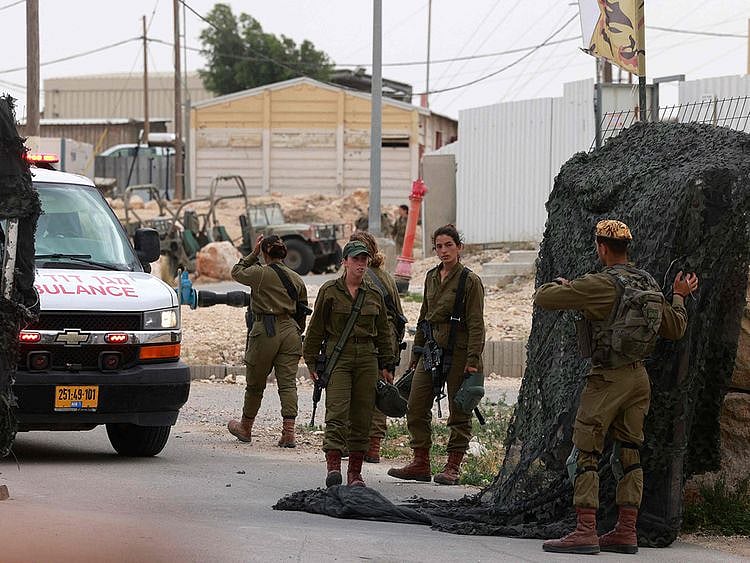 Soldiers near the Israeli Mount Harif military base near the city of Mitzpe Ramon in Israel's southern Negev desert, adjacent to the border with Egypt, on June 3, 2023.  