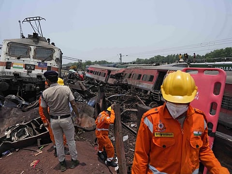 Rescuers work at the site of passenger trains that derailed in Balasore district, in the eastern Indian state of Orissa, on Saturday, June 3, 2023.  