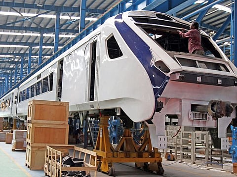 Employees working on manufacturing of Vande Bharat train at the Integral Coach Factory (ICF), in Chennai.