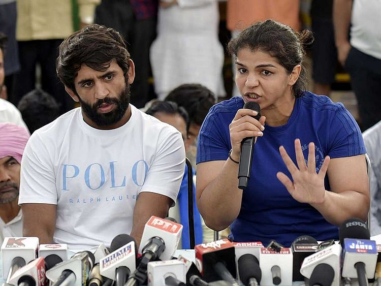 Wrestlers Sakshi Malik and Bajrang Punia,