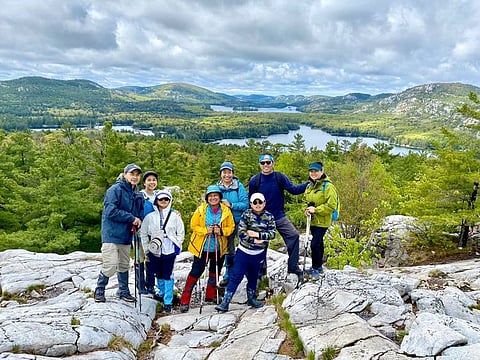Filipino hikers exploring Killarney, a well-known backpackers' destination in Ontario, Canada.