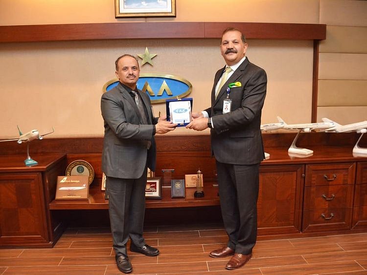 Saudi aviation team Lead Inspector Mohammad Al Ajami with the director security Pakistan Civil Aviation Authority Air Commodore (Retd.) Shahid Qadir.  