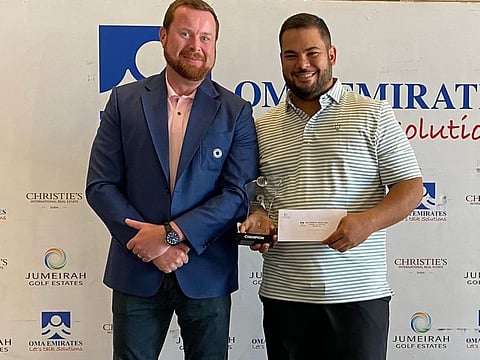 OMA Emirates Medalford - Champion Ricky Aybar (left) alongside Mens Club Captain Jonathan Hall