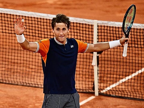 Norway's Casper Ruud celebrates after winning against Germany's Alexander Zverev at the French Open men's singles semi-final match at the Court Philippe-Chatrier in Paris on June 9, 2023. 