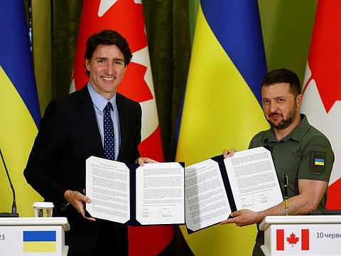 Canadian Prime Minister Justin Trudeau and Ukraine's President Volodymyr Zelensky show signed joint declaration during a press conference in Kyiv, on June 10, 2023.  