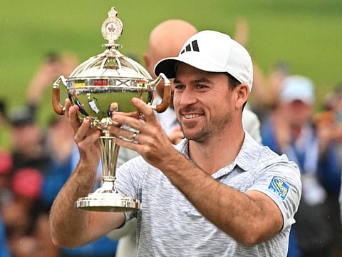 Nick Taylor holds the RBC Cup after winning the RBC Canadian Open golf tournament.