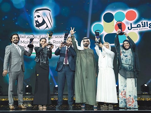 Archive image of His Highness Sheikh Mohammed bin Rashid Al Maktoum (third from right), Vice President and Prime Minister of the UAE and Ruler of Dubai, with winners of a previous edition of Arab Hope Makers