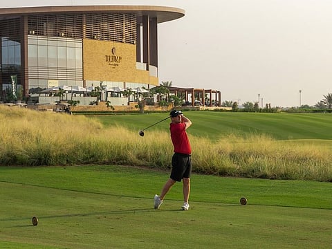 Craig Vance teeing off at Trump International Dubai