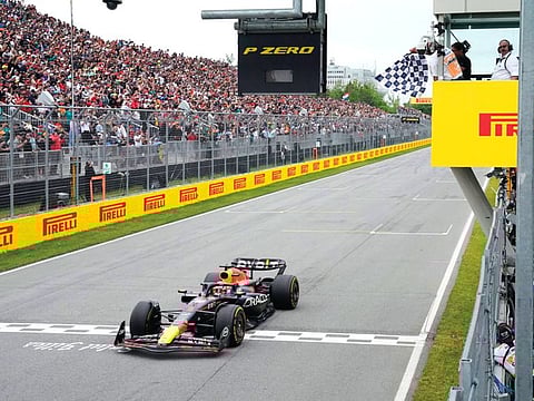 Red Bull's Max Verstappen takes the chequered flag to win the Canadian Grand Prix in Montreal on Sunday.