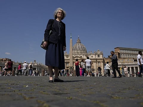 Sister Nathalie Becquart, the first female undersecretary in the Vatican's Synod of Bishops, poses for a photo in front of St. Peter's Square, Monday, May 29, 2023.