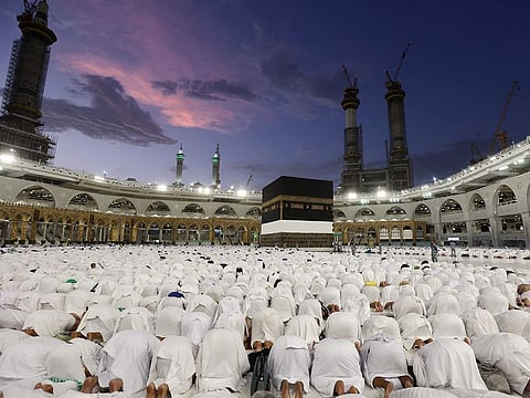 Pilgrims perform prayers around the Kaaba at the Grand Mosque in Mecca ahead of the Hajj pilgrimage, on June 19, 2023. 