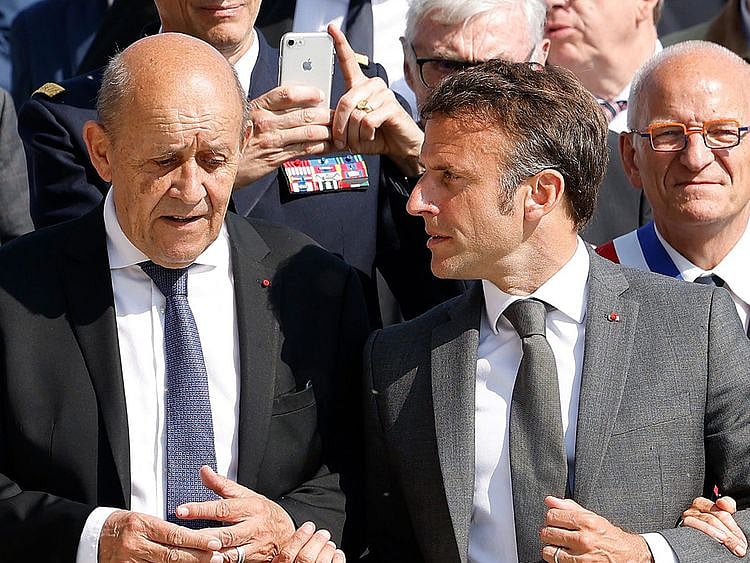 France's President Emmanuel Macron with his former Foreign Minister Jean-Yves Le Drian. Le Drian’s three-day visit to Lebanon comes a week after Lebanese lawmakers failed for a 12th time to elect a new president, drawing condemnation from the international community.