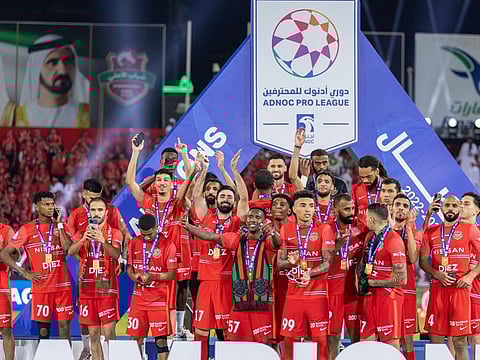 Shabab Al Ahli players celebrate their UAE Pro League victory.
