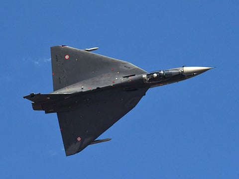 Indian Air Force (IAF) LCA Tejas performs an aerobatic display during the Aero India 2023 air show at Yelahanka air base in Bengaluru, India, February 13, 2023.  
